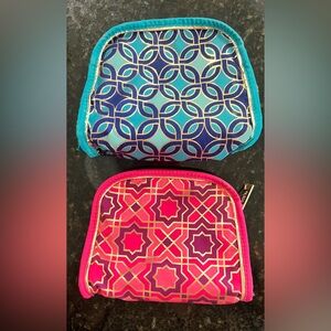 2 small patterned makeup bags